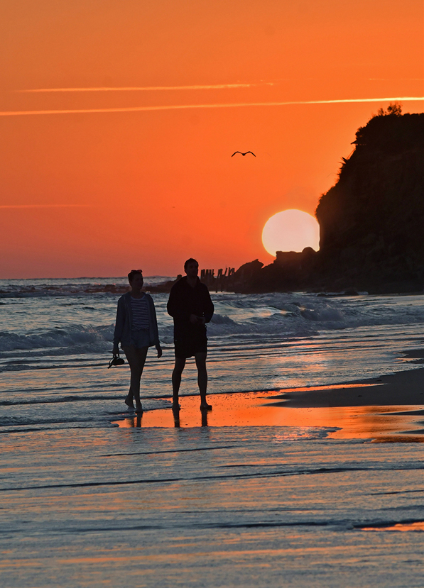 Strolling At Sunset by Brian Clark