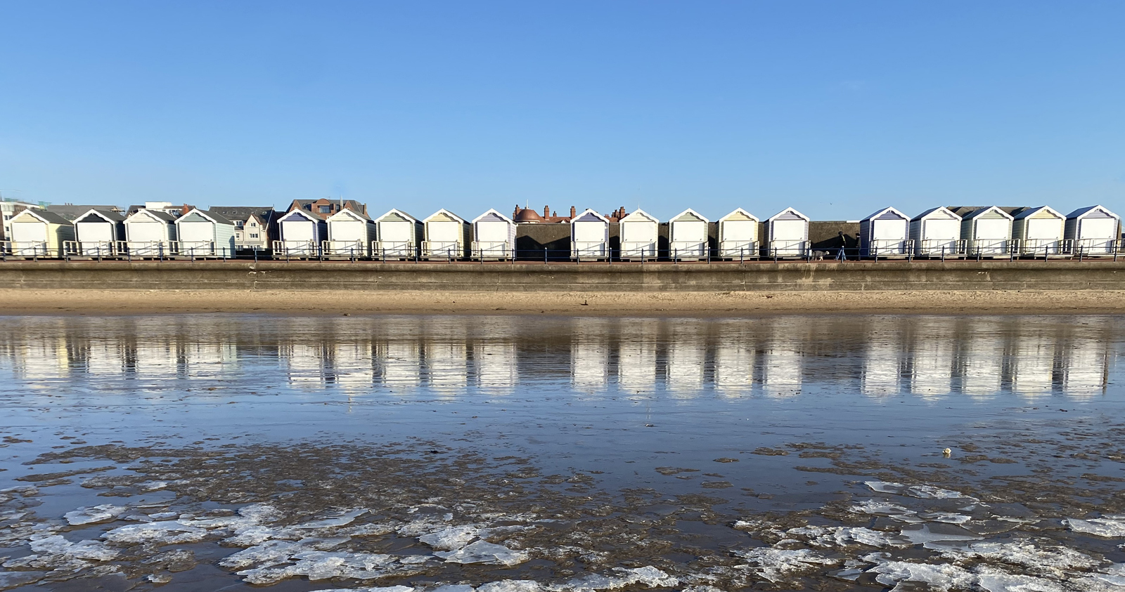 Beach Huts On An Icy Day by Anne Young