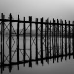 Cycling Home On Ubein Bridge