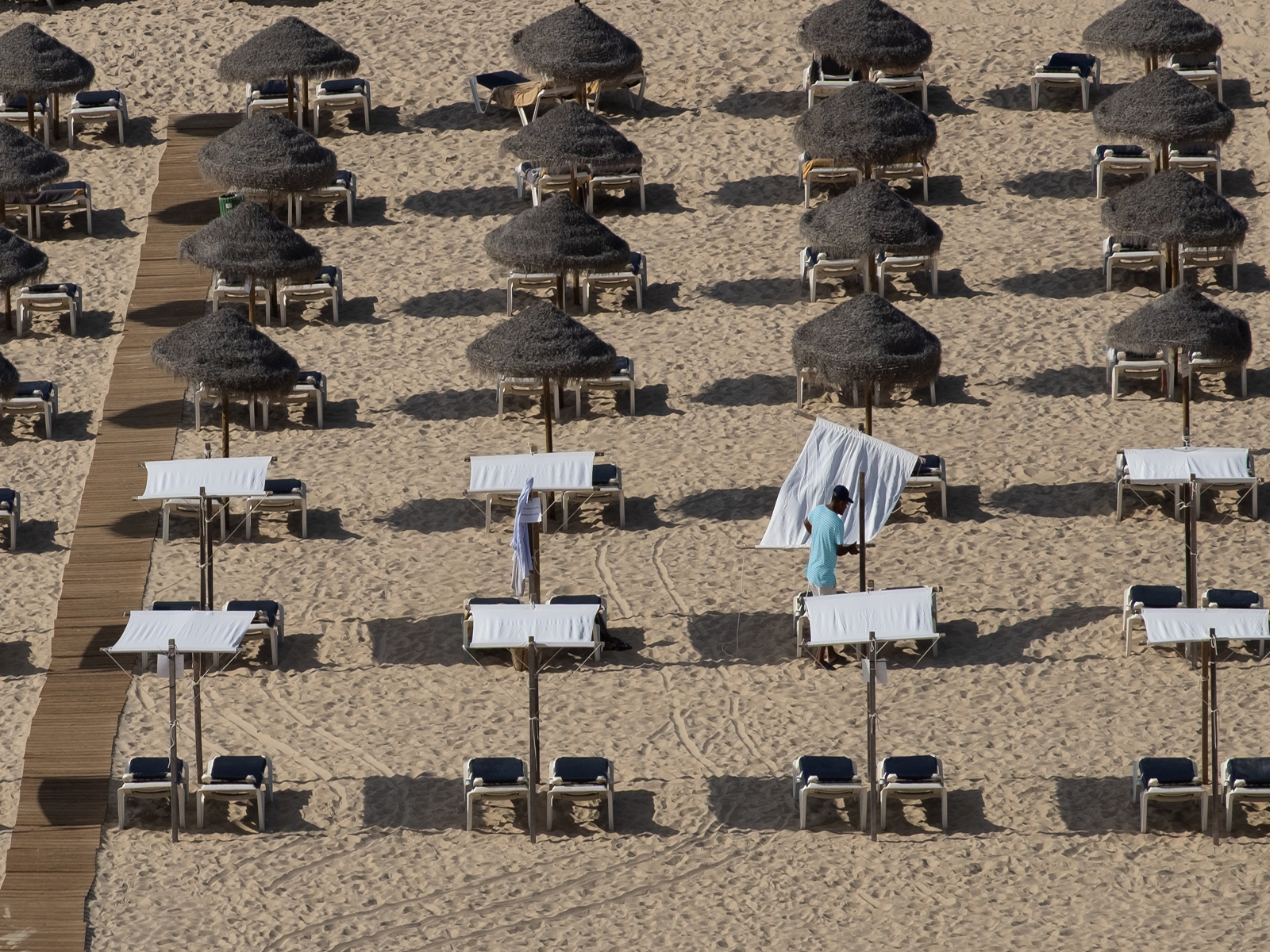 Preparing For A Hot Day At The Beach by John Scott — Score: 16 pts