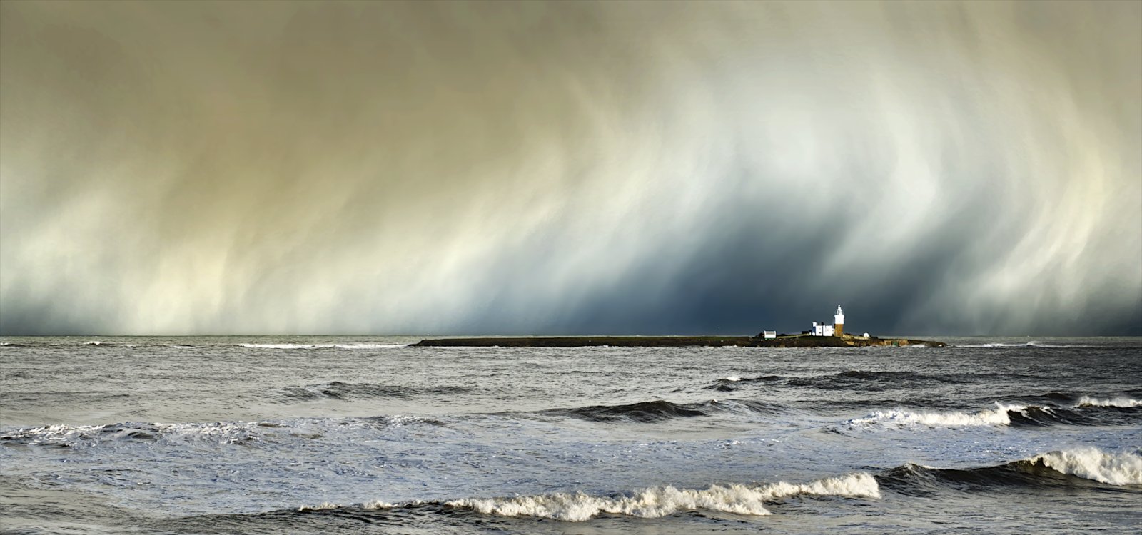 Commended in Scapes Print - Snow Showers Over Coquet Island by Christine Round