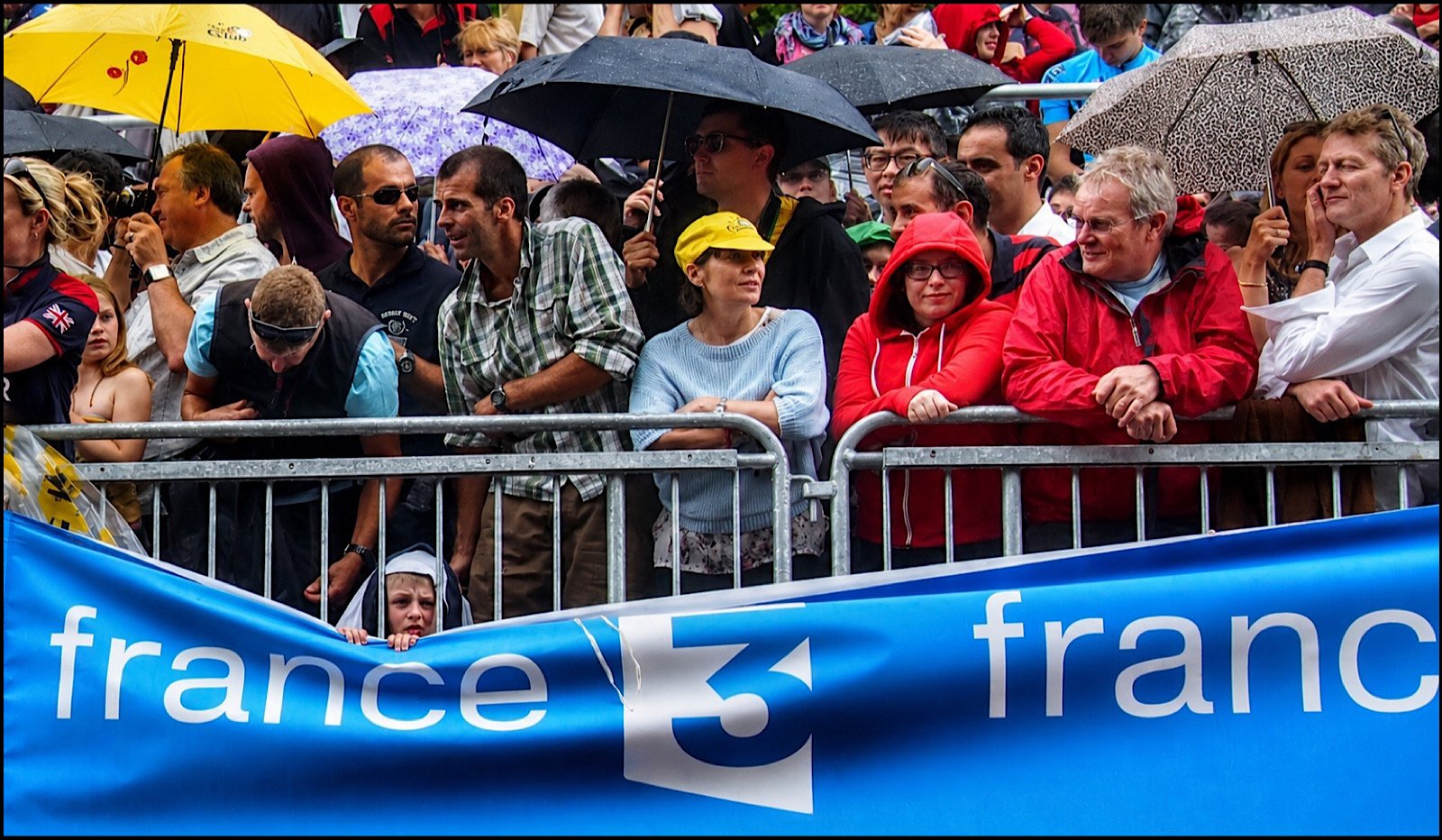 Waiting For Le Tour To Go By — by Peter Cotton — Score: 17 pts