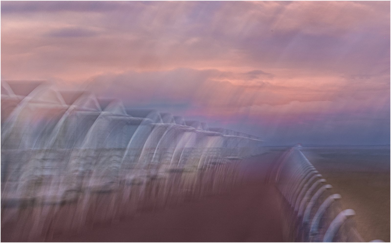 Evening Glow Over The Beach Huts — by Esther Parkinson — Score: 17 pts